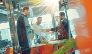 group-five-business-people-are-shaking-hands-office copy.jpg