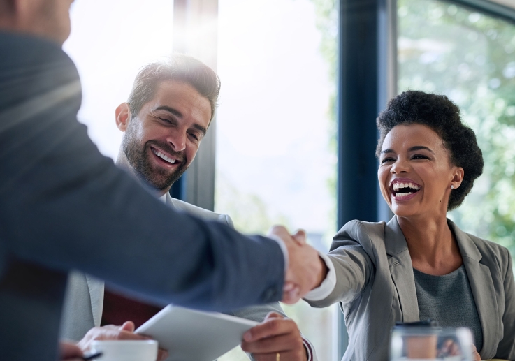 Image-Handshake-Man and Black woman